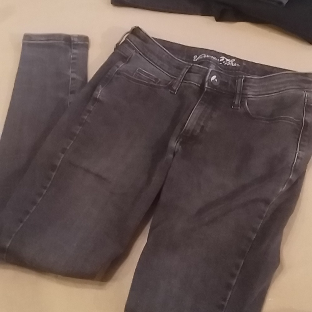 Lightly distressed black jeans from Universal Threads, size 2/26S